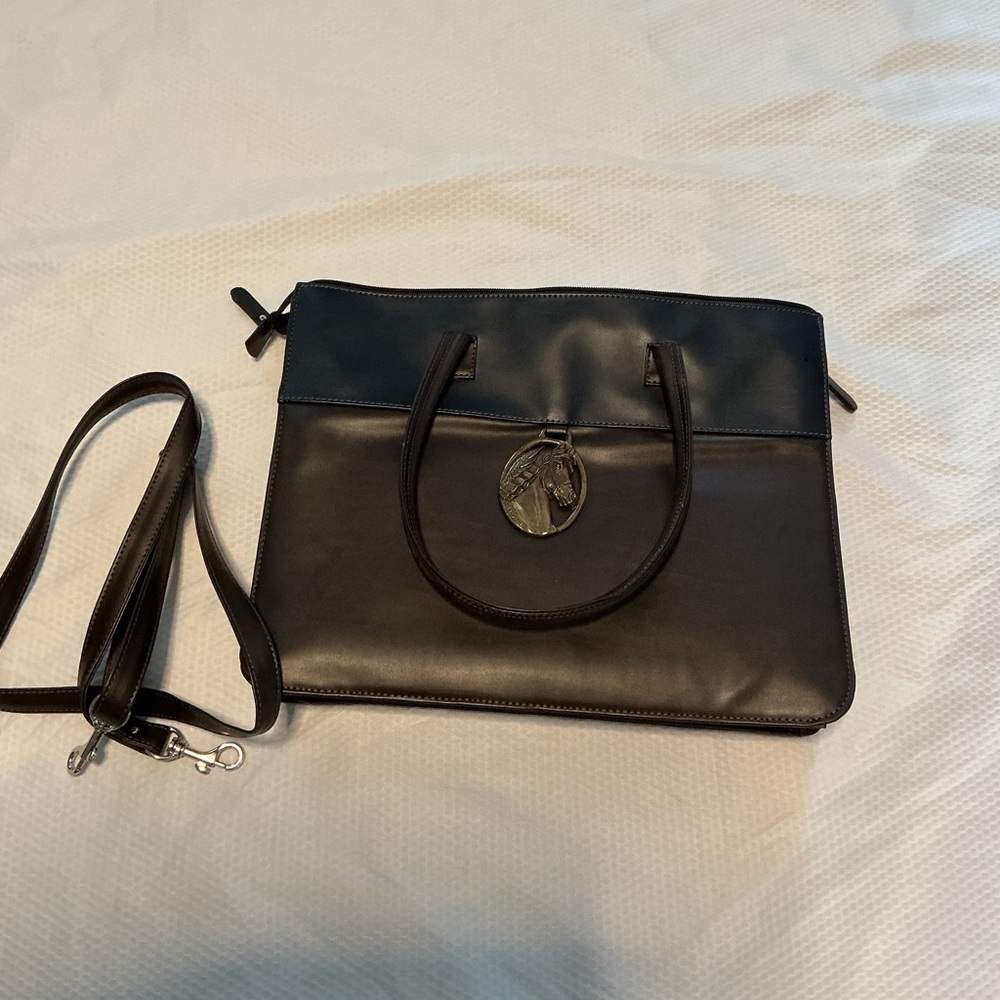 Sleek Black Messenger Bag . With a horse design in front